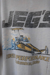 1980年代のヴィンテージ JEG'S ハイパフォーマンス リンガー Tシャツ ヴィンテージ レーシング プリント パイピング ショート キックス