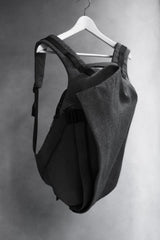 Cote&Ciel Isar Backpack, a French fashion and functional bag brand, features a waterproof canvas backpack in heather gray.