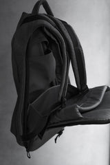 Cote&Ciel Isar Backpack, a French fashion and functional bag brand, features a waterproof canvas backpack in heather gray.