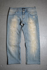 Dolce & Gabbana Distressed Denim Jeans Distressed low-rise jeans made in Italy