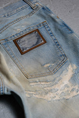 Dolce & Gabbana Distressed Denim Jeans Distressed low-rise jeans made in Italy