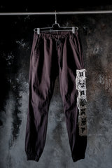 UNIF Hannya Mask Embroidered Side Panel Jogger Pants 般若刺繡貼布側章縮口棉褲