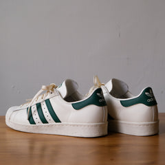アディダス スーパースター 82 スニーカー ホワイト/ダークグリーン クラシック クリーム シェルトゥ
