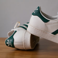 アディダス スーパースター 82 スニーカー ホワイト/ダークグリーン クラシック クリーム シェルトゥ