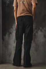 troubled waters CROSS FRINGE PANTS