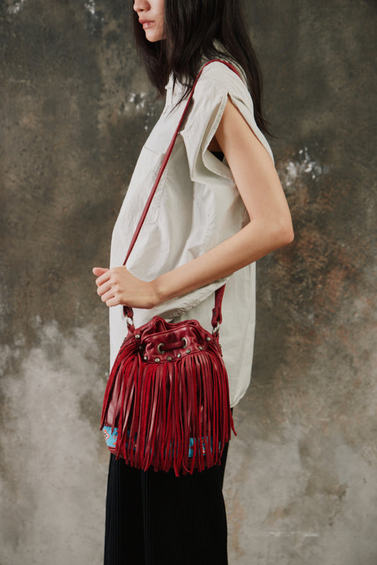 Tylie Malibu Red Fringe Leather Bucket Bag