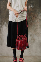 Tylie Malibu Red Fringe Leather Bucket Bag