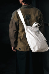 SNOW JACKET CONVERTED TO HELMET BAG